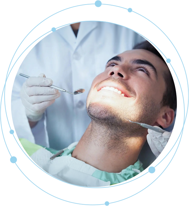 A man is getting his teeth checked by an dentist.